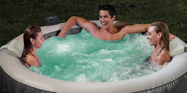 Friends relaxing in their Intex greywood deluxe 4 person hot tub